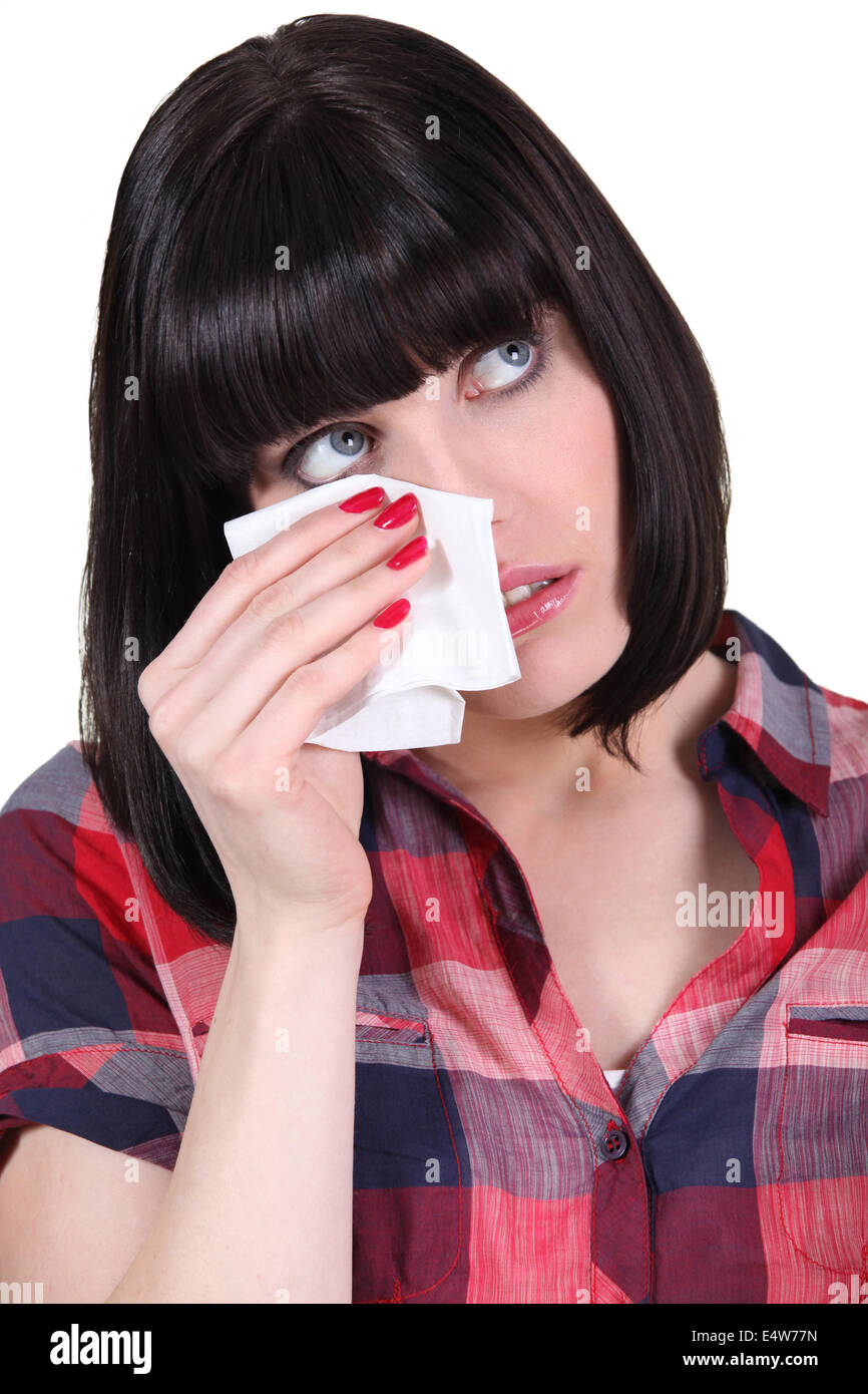 Brunette avec des tissus Banque D'Images