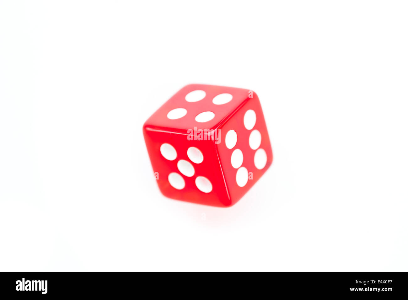 Red dice in motion Banque D'Images