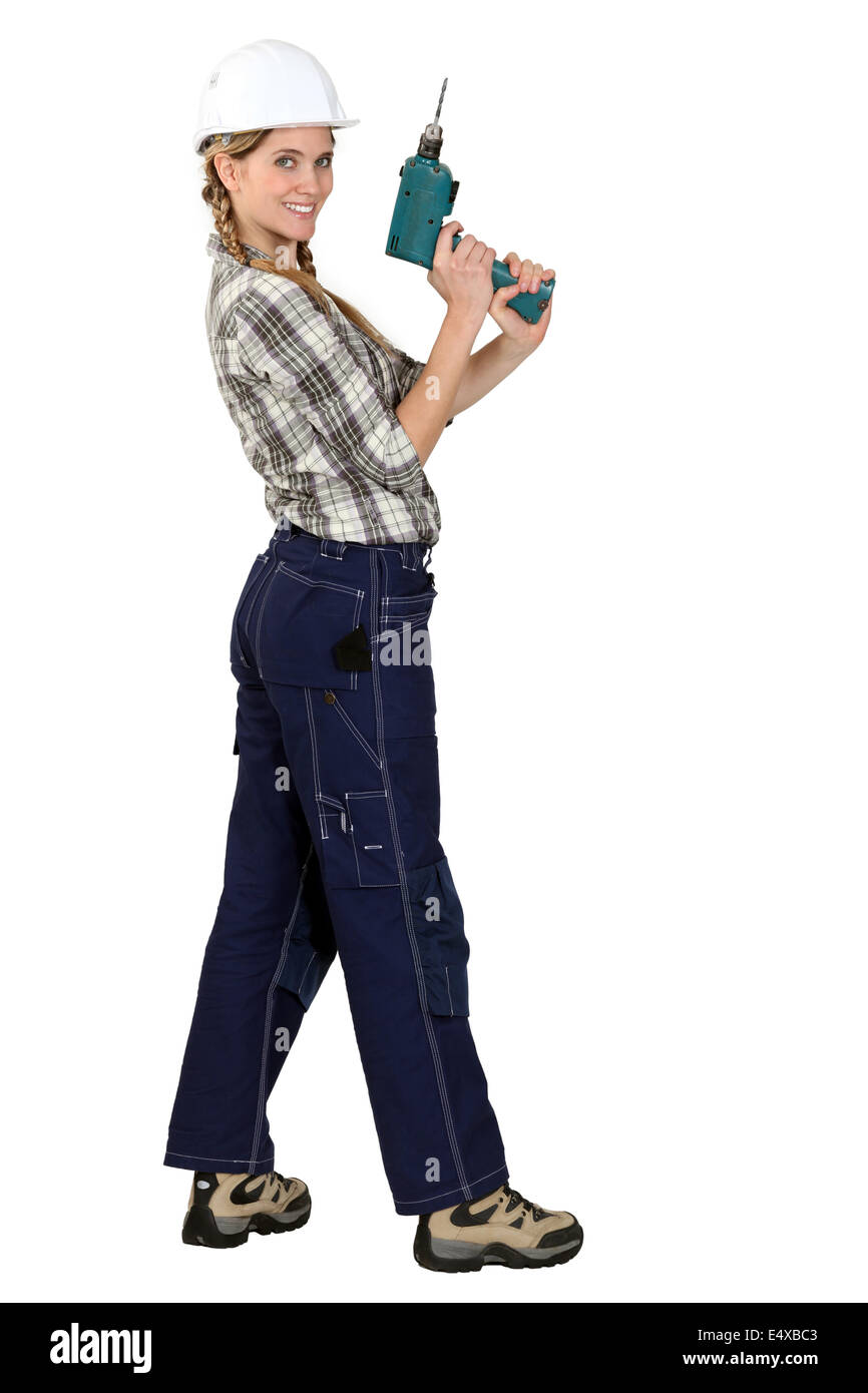 Tradeswoman avec tournevis électrique Banque D'Images