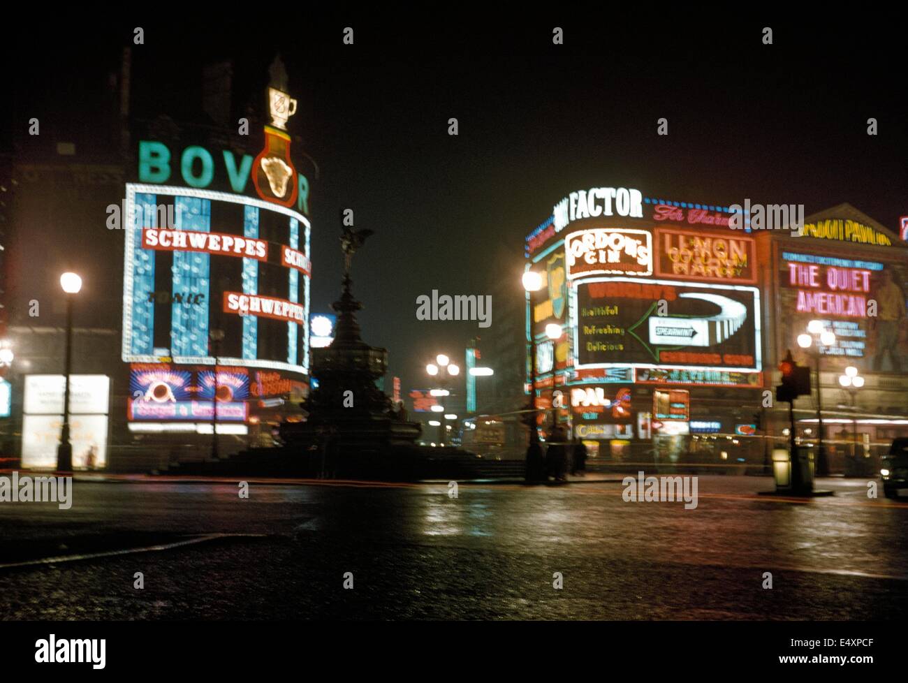 Piccadilly Circus par nuit, 1958. Banque D'Images