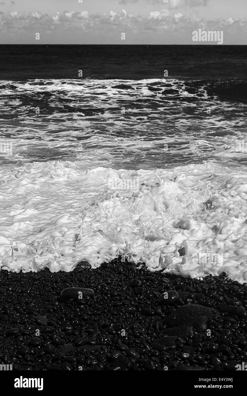Plage en pierre noire Banque D'Images
