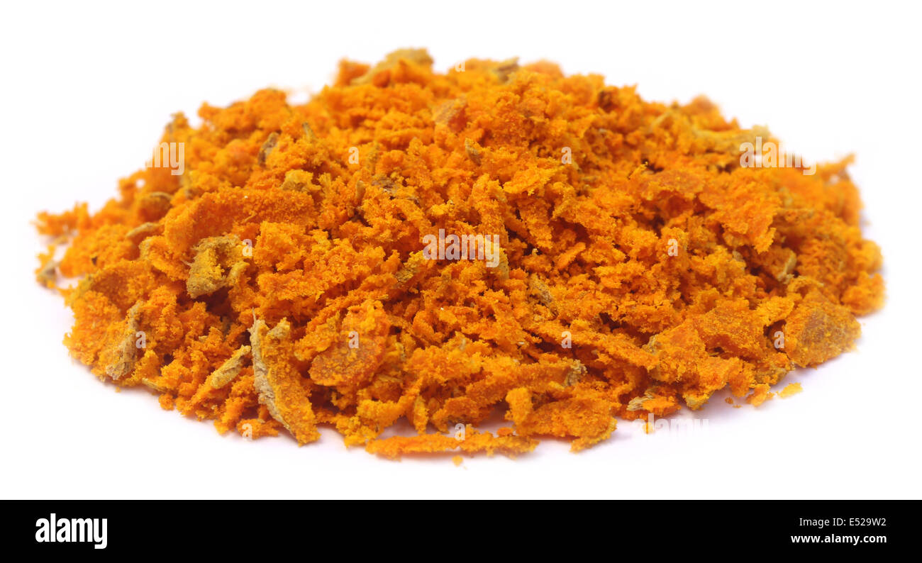 Le curcuma râpé sur fond blanc Banque D'Images