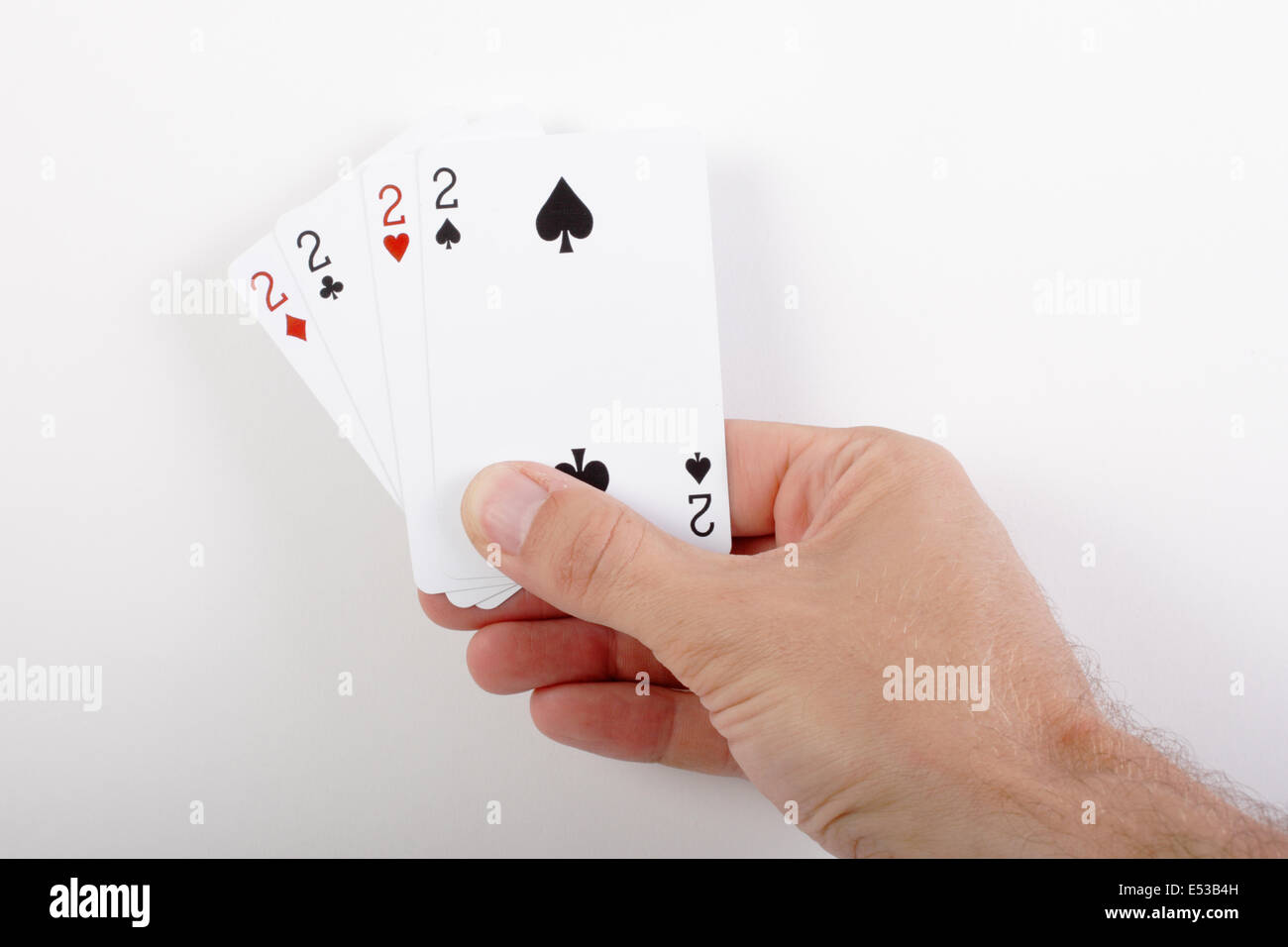 Main tenant quatre paires Banque D'Images