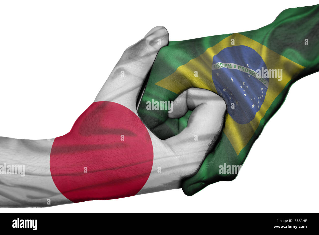 Poignée de main entre diplomatique Pays : drapeaux du Japon et du Brésil surimprimées les deux mains Banque D'Images