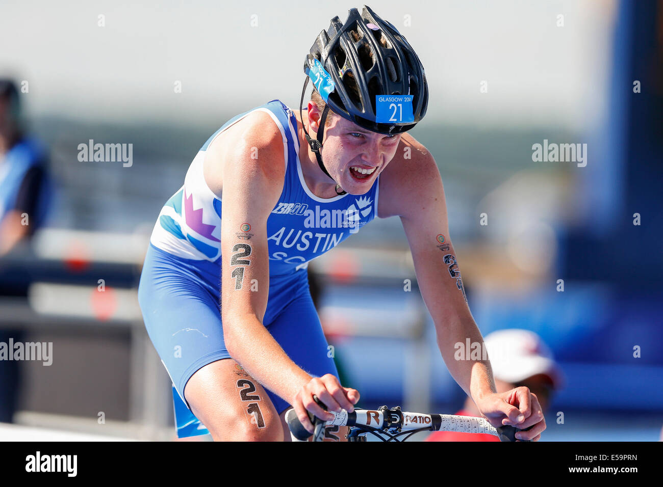 Glasgow, Ecosse. 24 juillet, 2014. Glasgow 2014 Jeux du Commonwealth. Mens Triathlon. Marc Austin d'Écosse cherche dans la douleur après collage vaillamment avec les frères Brownlee tout au long de la première moitié de la course. Credit : Action Plus Sport/Alamy Live News Banque D'Images