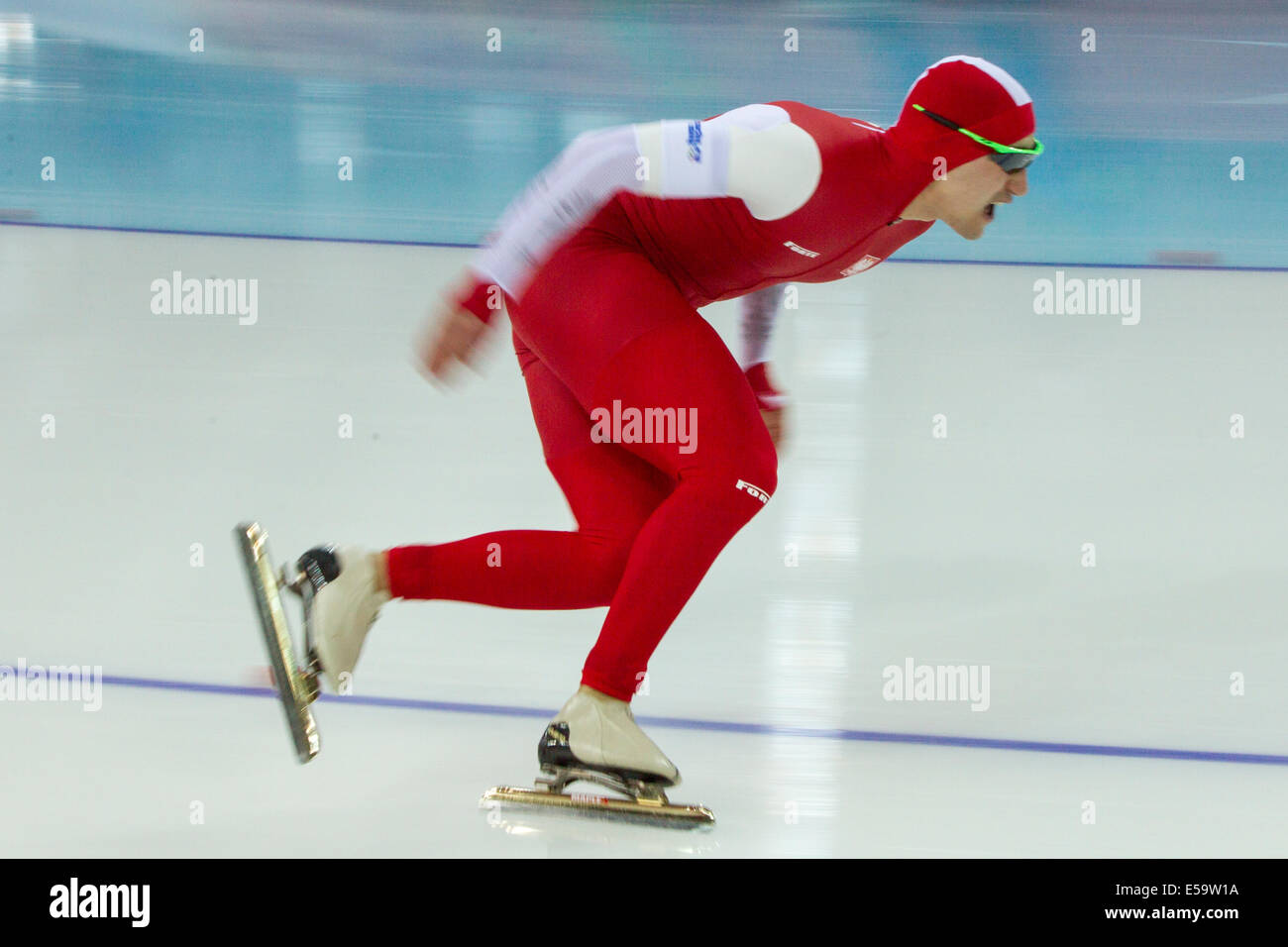 En compétition dans Men's 500m en patinage de vitesse aux Jeux Olympiques d'hiver de Sotchi en 2014, Banque D'Images