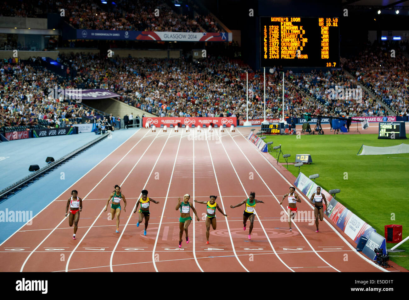 Glasgow, Ecosse. 28 juillet, 2014. Les Jeux du Commonwealth de Glasgow 2014 Jour 5. L'athlétisme, l'athlétisme. Okagbare bénédiction du Nigéria (piste 5) remporte la finale du 100 m femmes Veronica Campbell-Brown de la Jamaïque (4 voies) en 2ème et Kerron Stewart de la Jamaïque (3) dans le troisième. Credit : Action Plus Sport/Alamy Live News Banque D'Images