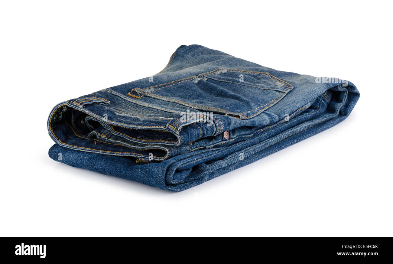 Blue Jeans plié sur un fond blanc Banque D'Images