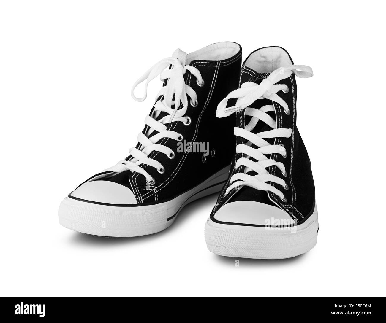 Haut top sneakers noir sur fond blanc Banque D'Images