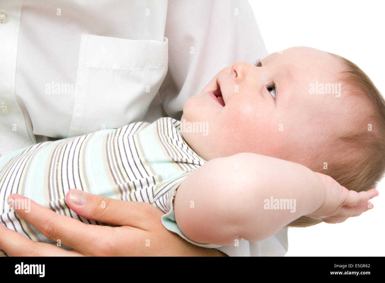 Heureux petit bébé dans mother's hands Banque D'Images