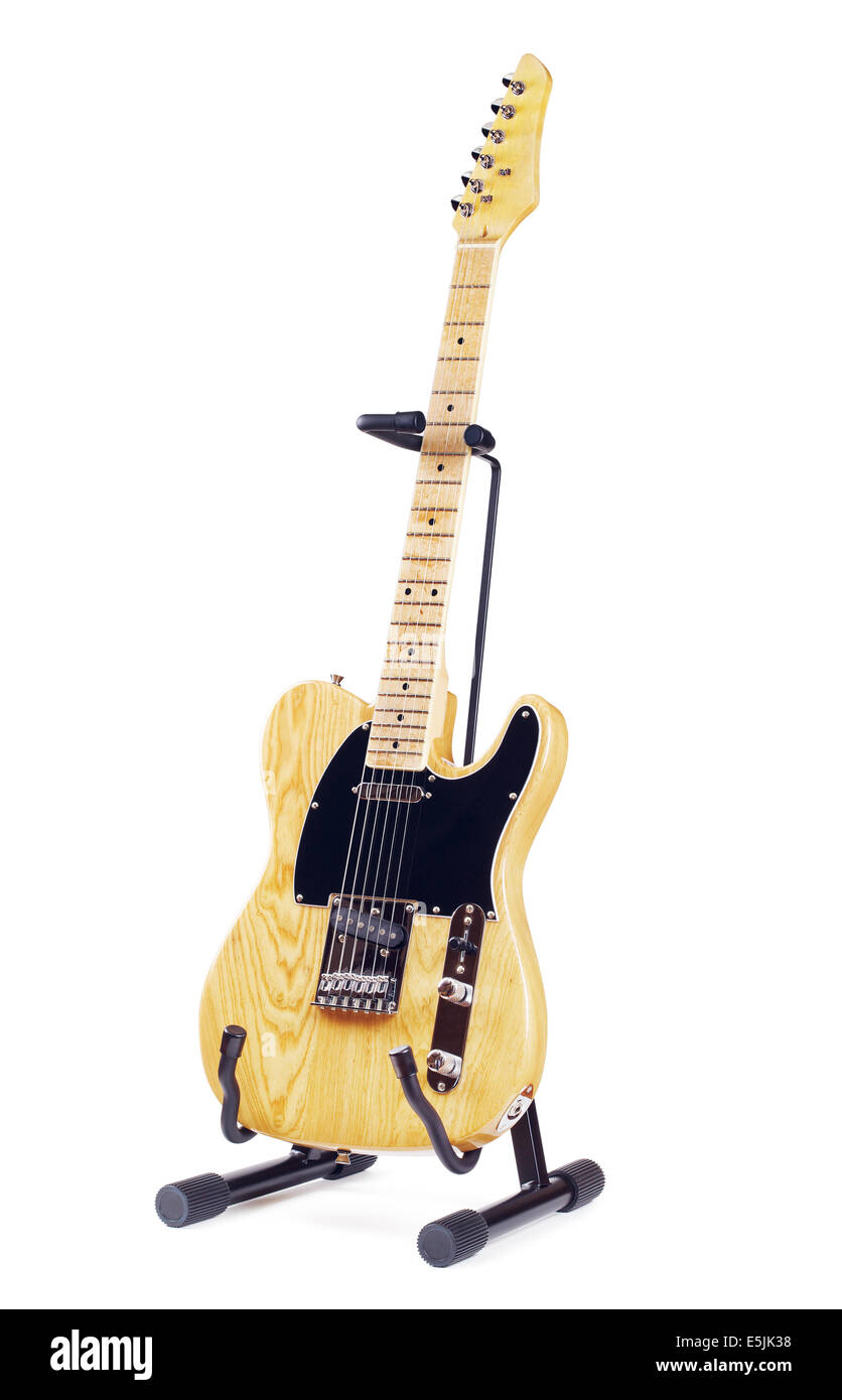 Guitare électrique jaune sur le stand, isolé sur fond blanc Banque D'Images