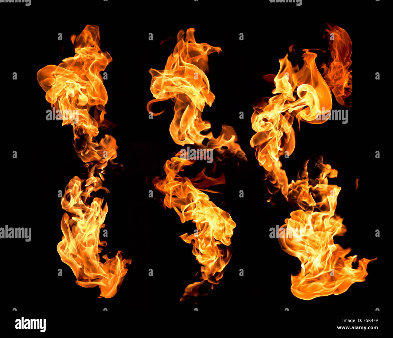 Les flammes rouges sur fond noir. Banque D'Images Les flammes rouges sur fond noir. Banque D'Images