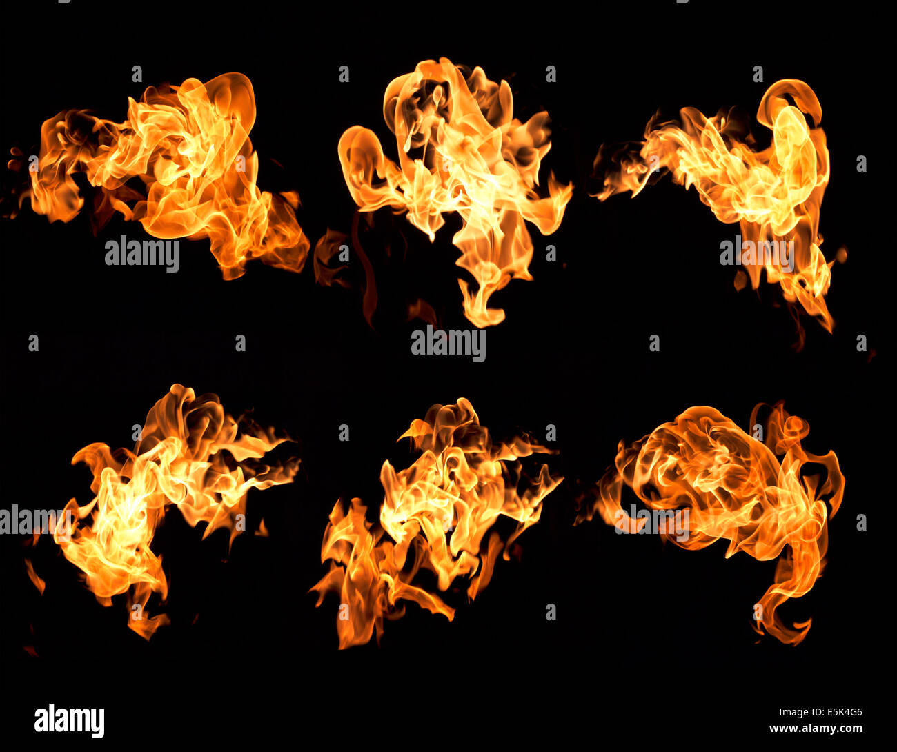 Les flammes rouges sur fond noir. Banque D'Images Les flammes rouges sur fond noir. Banque D'Images