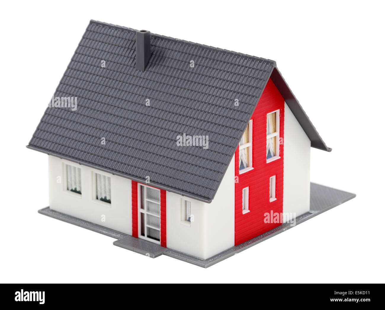 Modèle d'une maison isolée sur fond blanc Banque D'Images