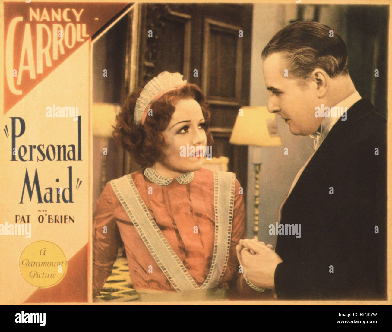 Femme de chambre personnelle, lobbycard Nous, de gauche : Nancy Carroll, Ernest Lawford, 1931 Banque D'Images