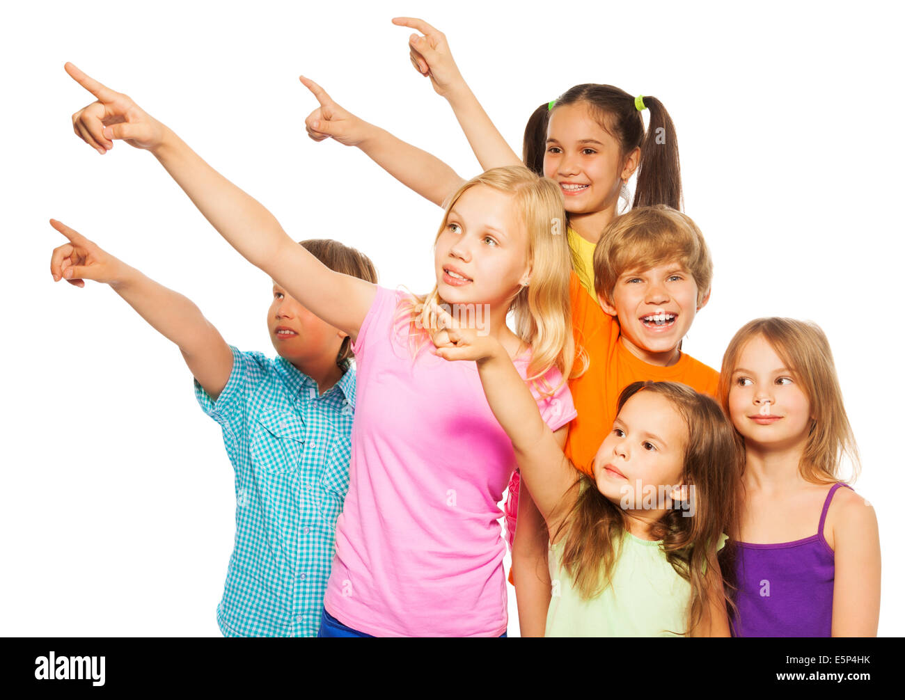 Six enfants heureux pointer du doigt Banque D'Images