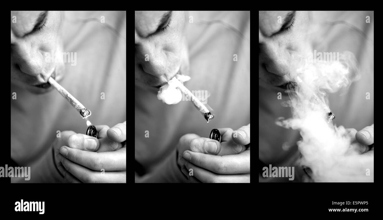 Homme de fumer de la marijuana ou du haschisch cigarette. Banque D'Images
