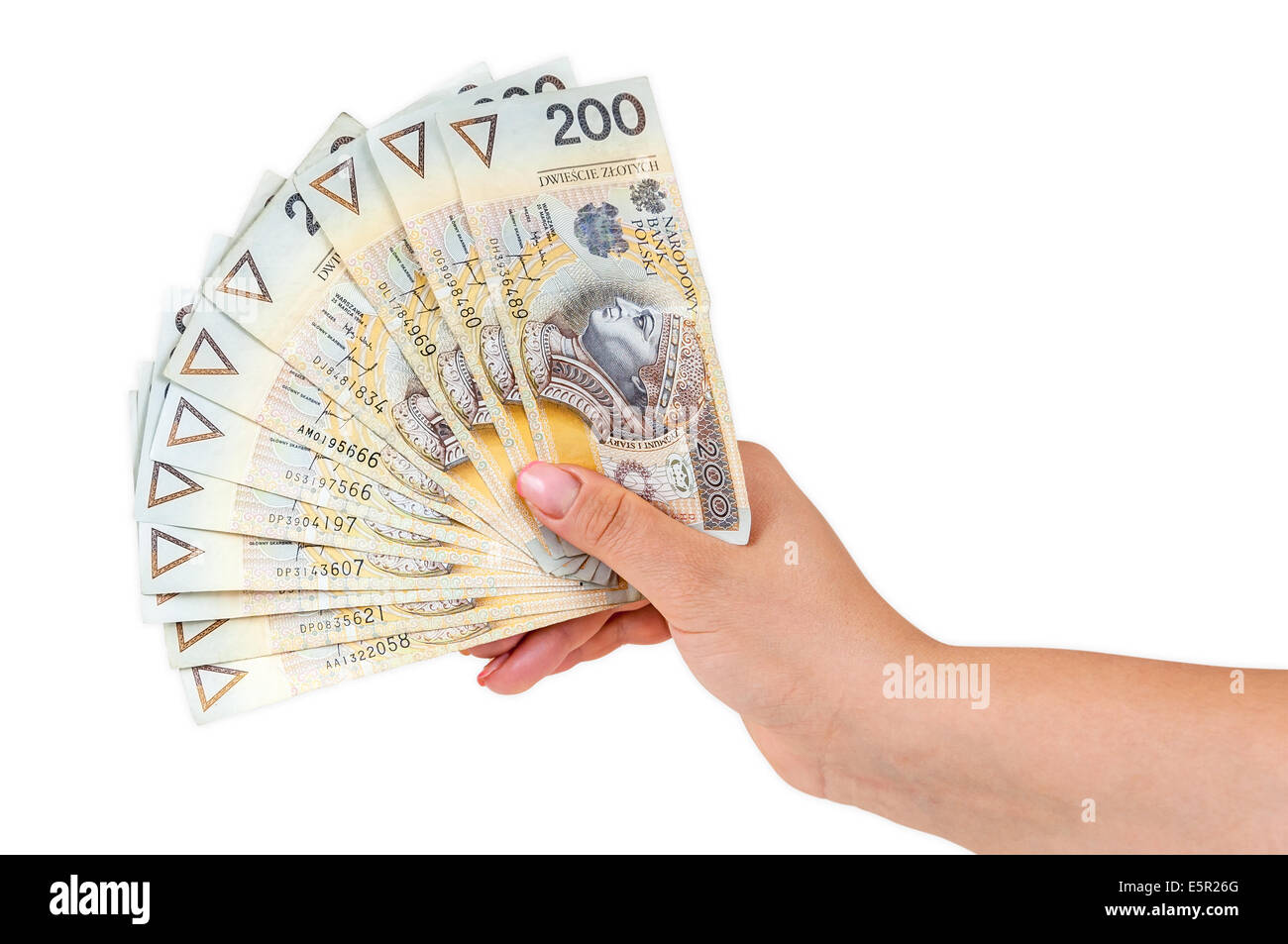 Main tenant 200 zloty polonais billets isolé sur fond blanc avec clipping path Banque D'Images