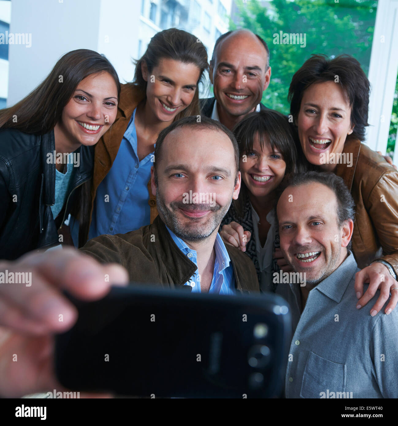 Groupe de personnes taking self portrait photograph Banque D'Images