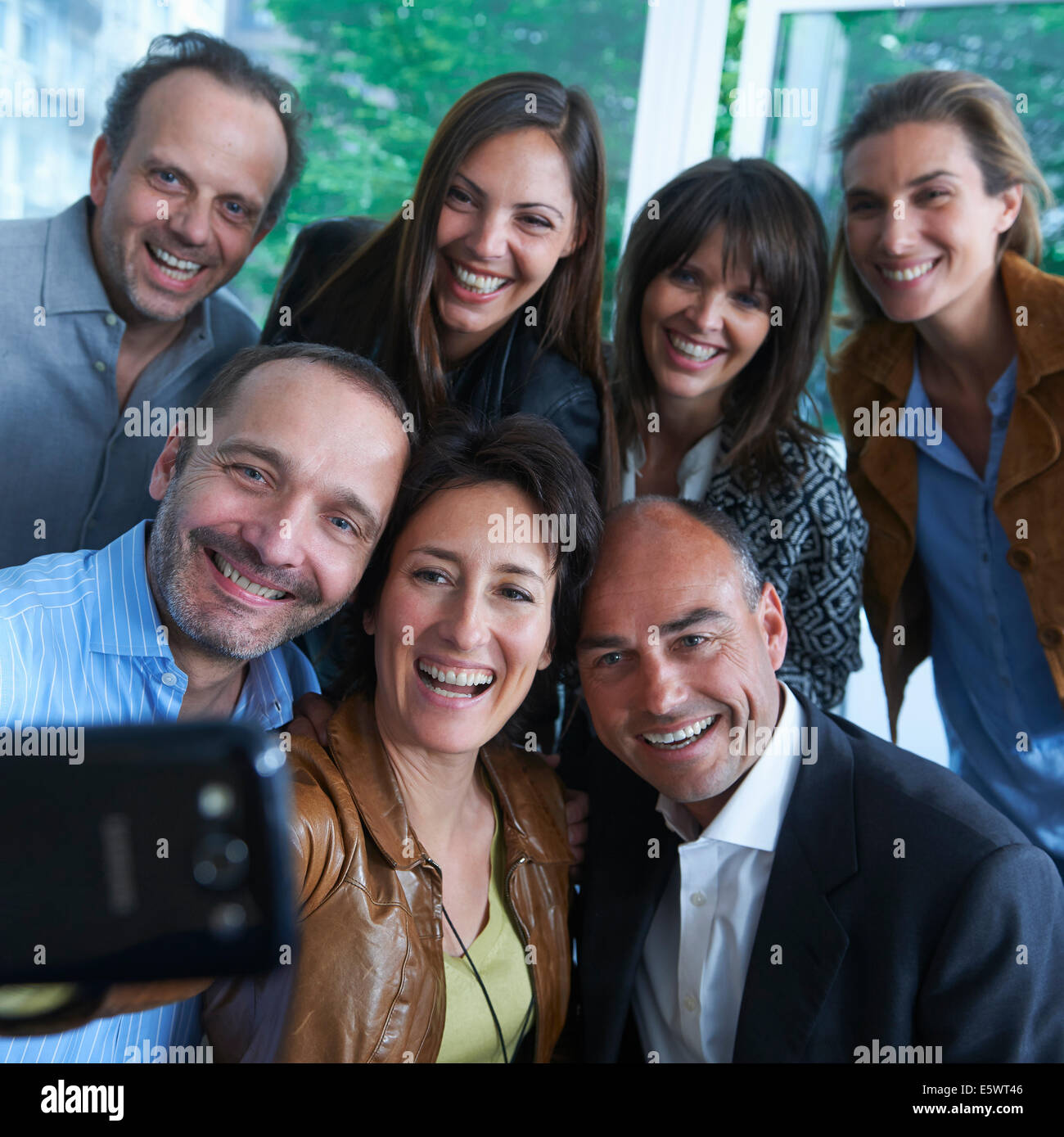 Groupe de personnes taking self portrait photograph Banque D'Images