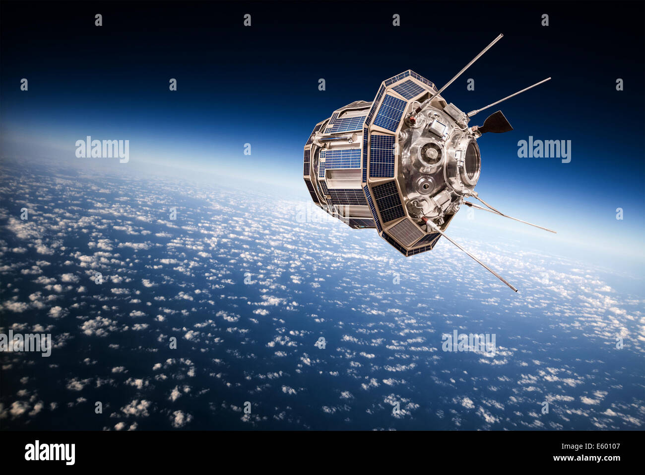 Satellite spatial en orbite autour de la terre Banque D'Images