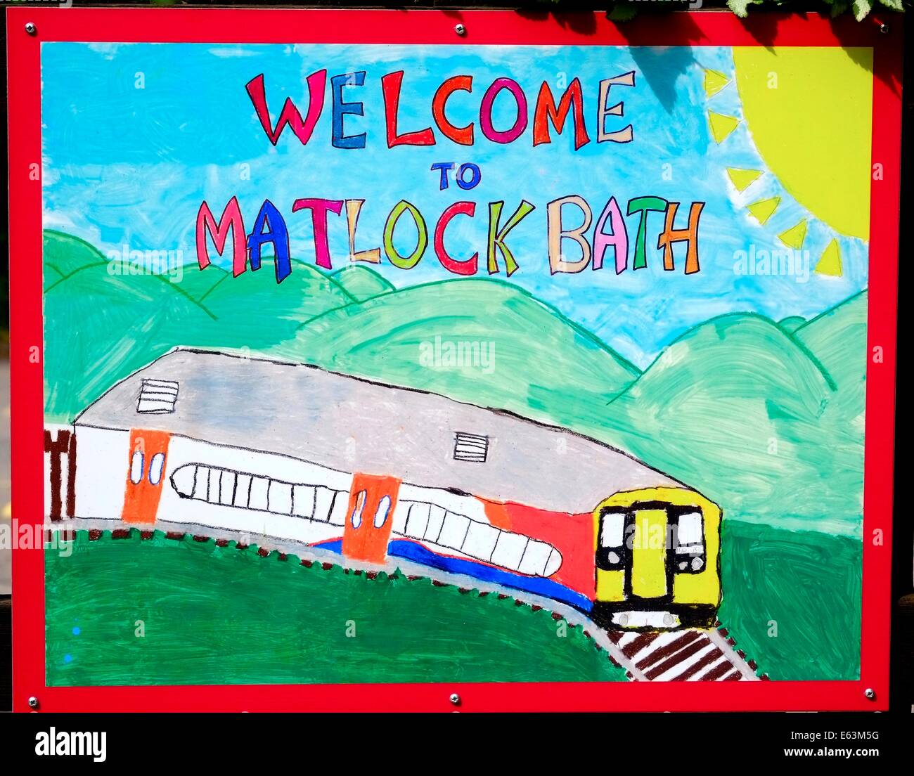 Bienvenue à Matlock Bath peinture pour enfants sur l'affichage dans la gare Banque D'Images