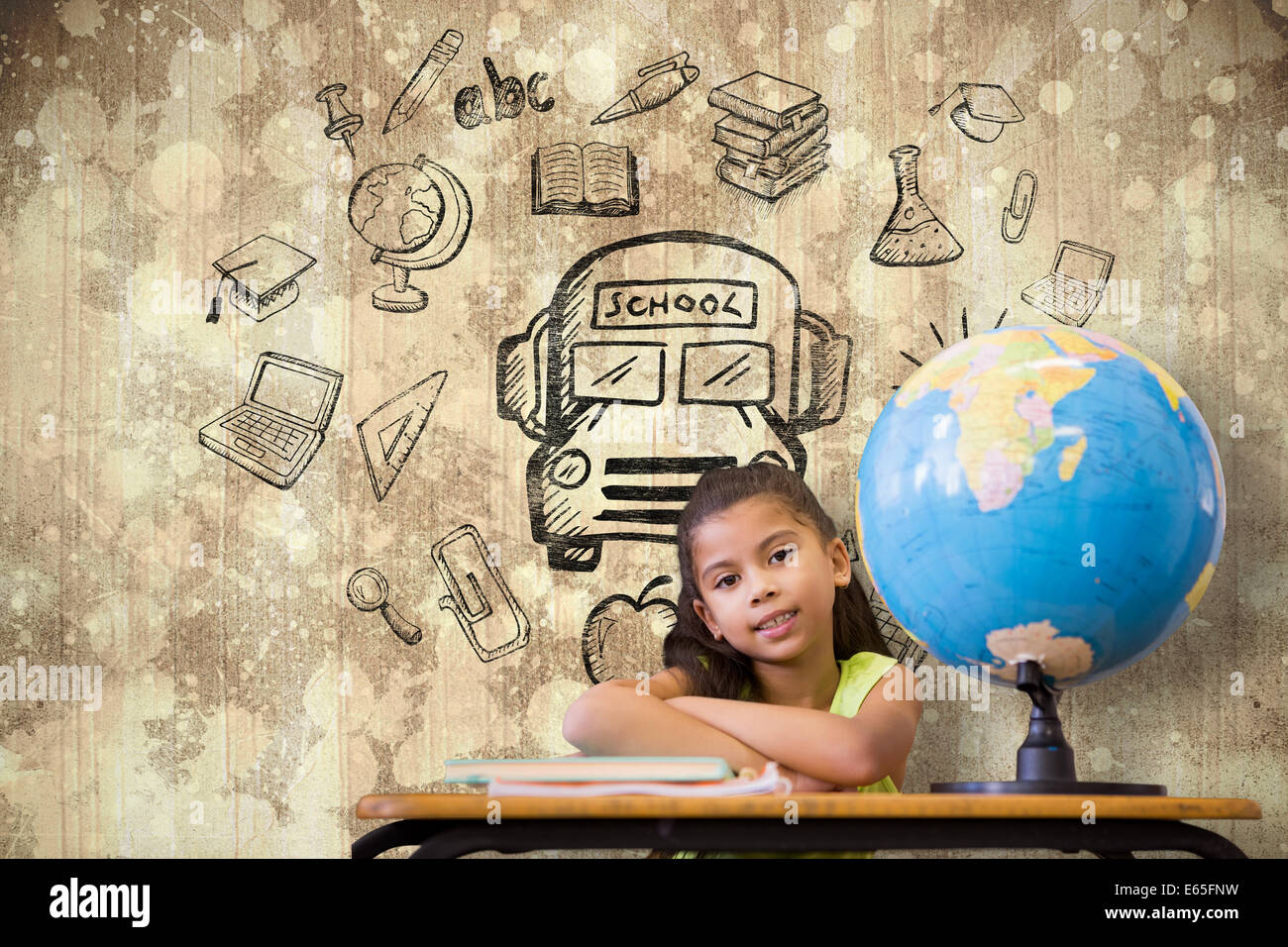 Image composite de cute pupils sitting at desk Banque D'Images