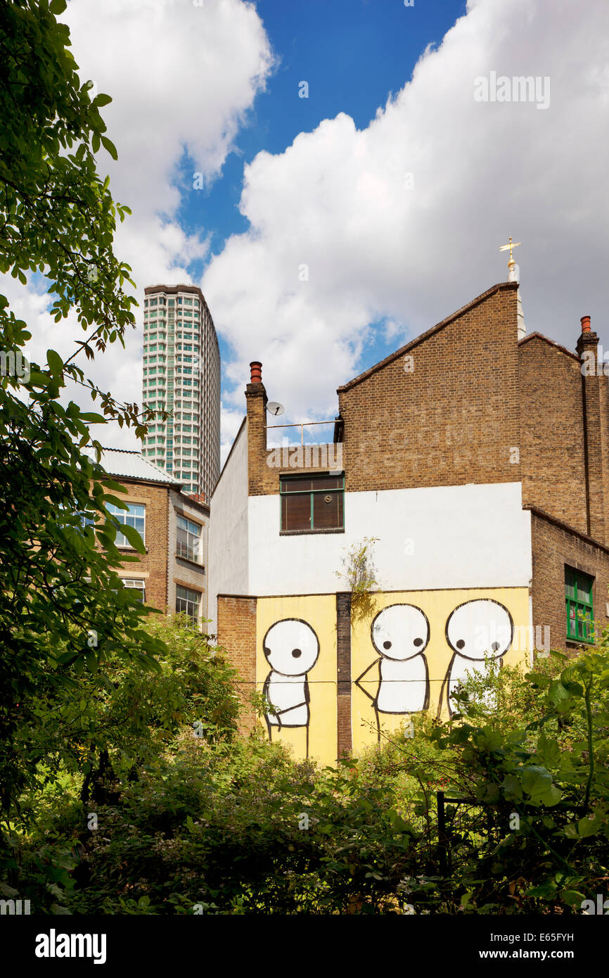 Le Graffiti ou l'art de rue par l'artiste urbain Londres Stik Banque D'Images