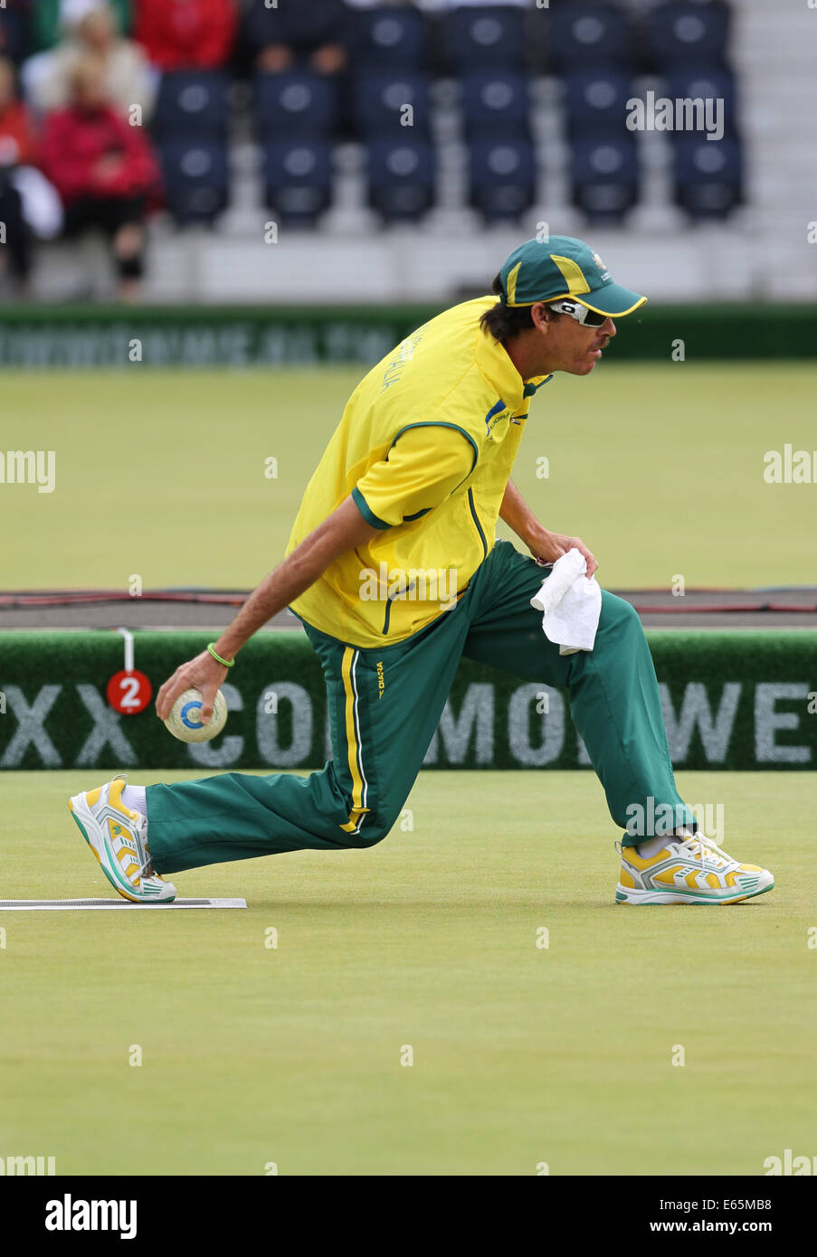 Nathan Rice de l'Australie v l'Inde dans le match pour la médaille de bronze dans la mens fours à Lorne Lawn Bowls Centre, 2014 Banque D'Images