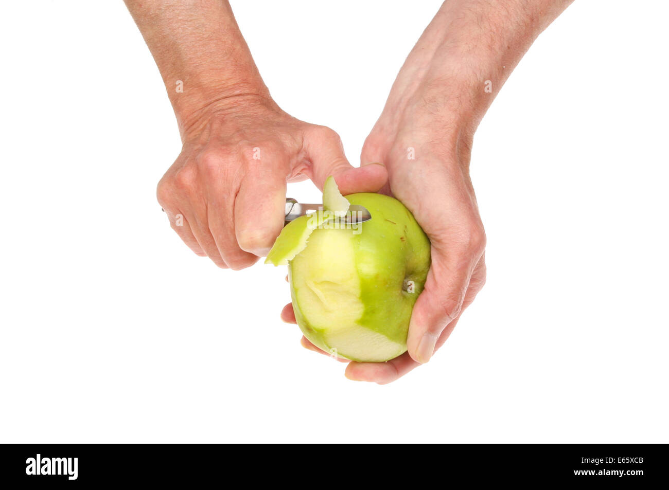 Libre d'une paire de mains un peeling apple cuisson isolés contre white Banque D'Images
