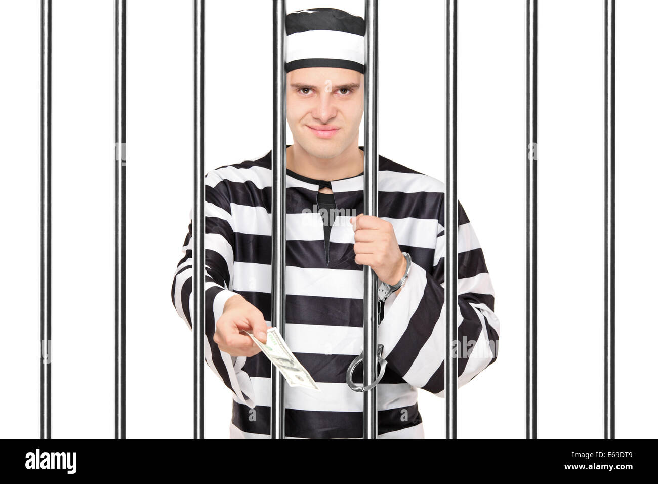 L'offre à quelqu'un pot-de-prisonnier derrière les barreaux Banque D'Images
