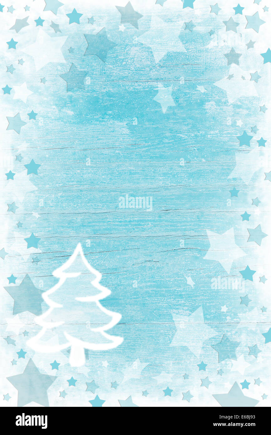 Ou bleu turquoise fond de noël en bois avec de la neige, des étoiles et un arbre. Le style Shabby chic. Banque D'Images