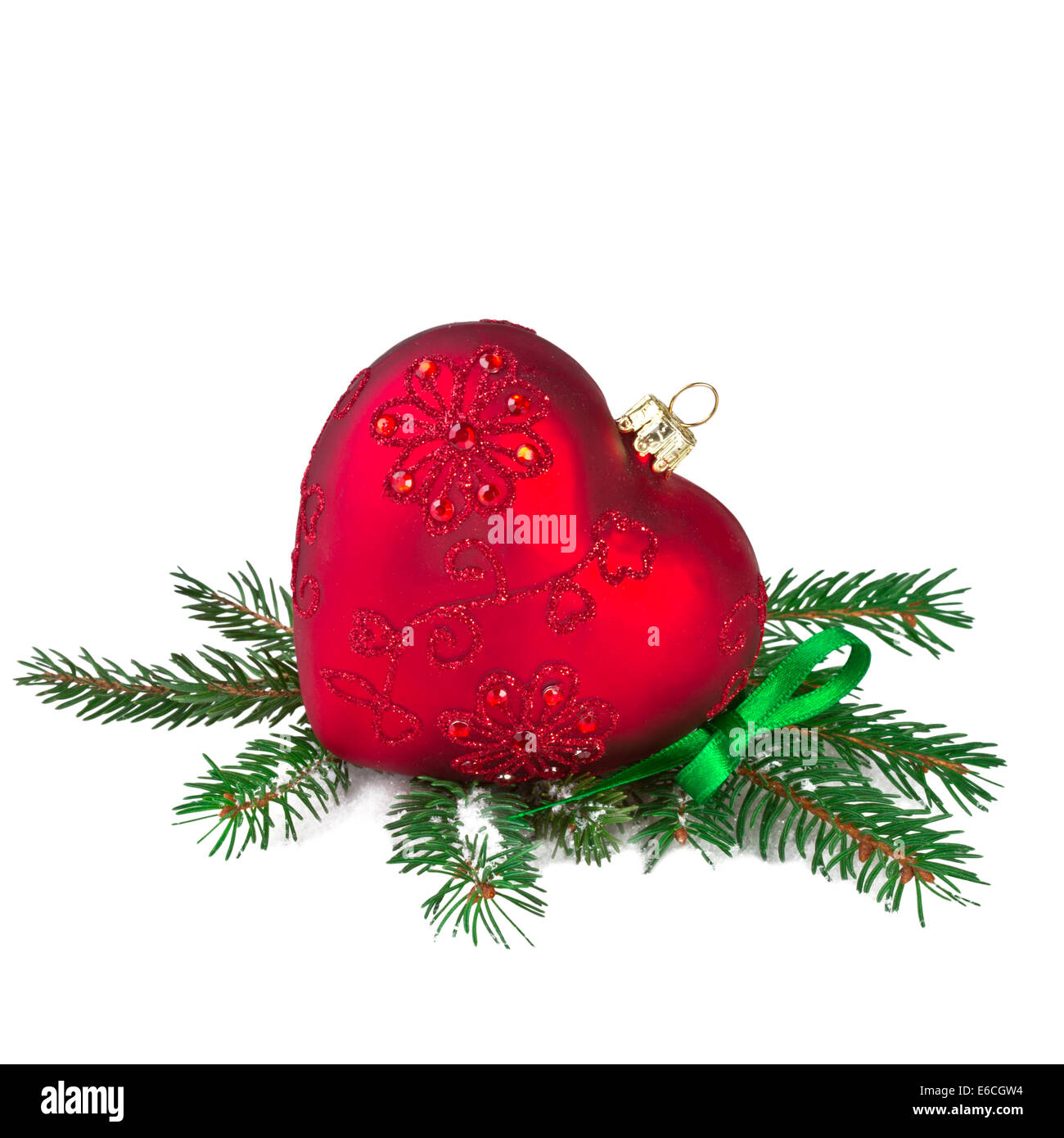 Coeur rouge de Noël avec des branches de sapin Banque D'Images