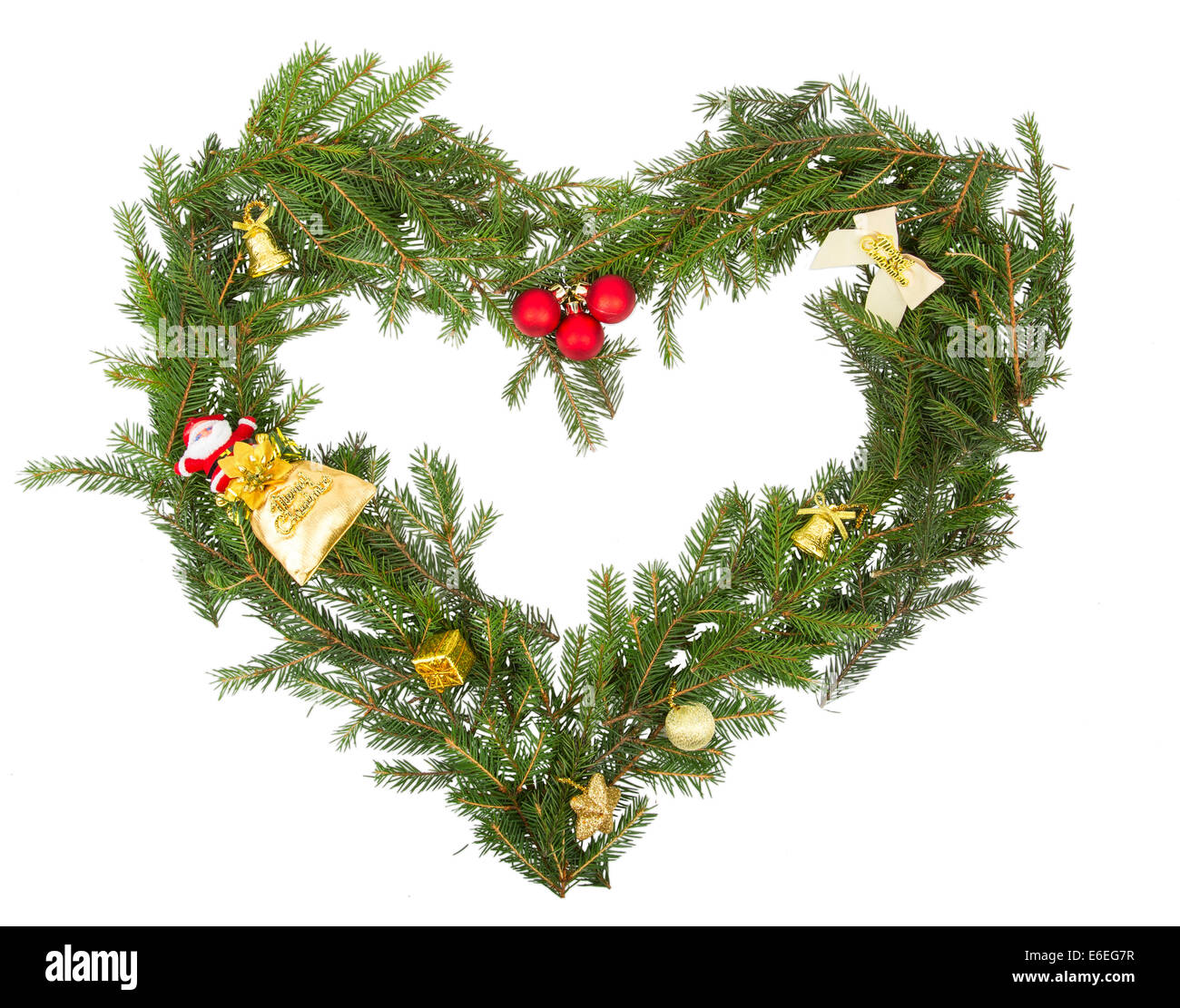 Cadre de Noël en forme de coeur avec décorations jaune Banque D'Images