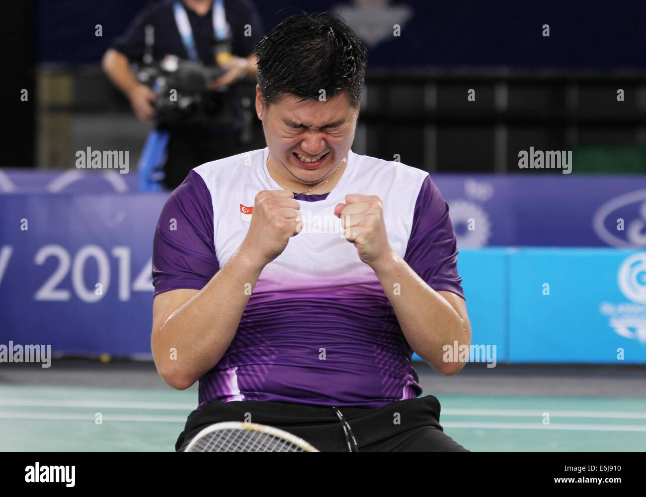 Chayut Triyachart de Singapour v Angleterre après avoir remporté la demi-finale de mens double en badminton au Jeux du Commonwealth de 2014 Banque D'Images