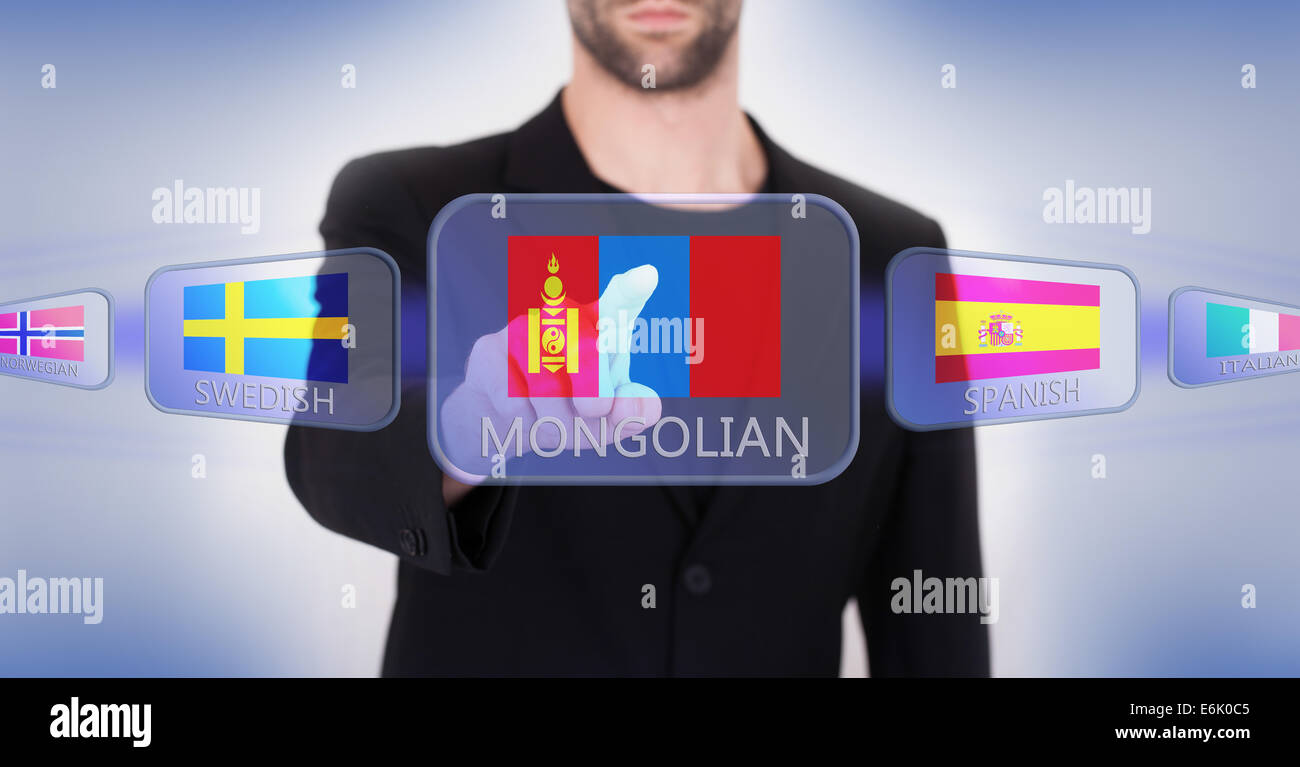 En poussant à la main sur une interface d'écran tactile, le choix de langue ou de pays, la Mongolie Banque D'Images