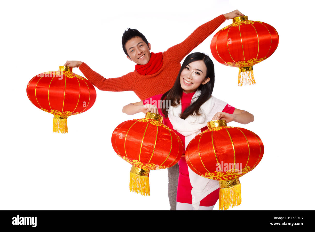 Les jeunes couples célébrant le Nouvel An chinois Banque D'Images