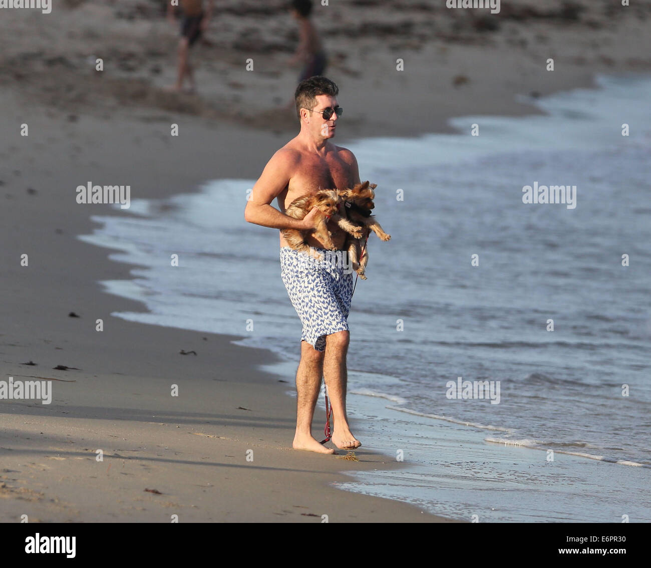 Simon Cowell et Lauren Silverman passez du bon temps à Miami Beach avec nouveau-né fils Eric Où : Miami Beach, Florida, United States Quand : 23 Mars 2014 Banque D'Images