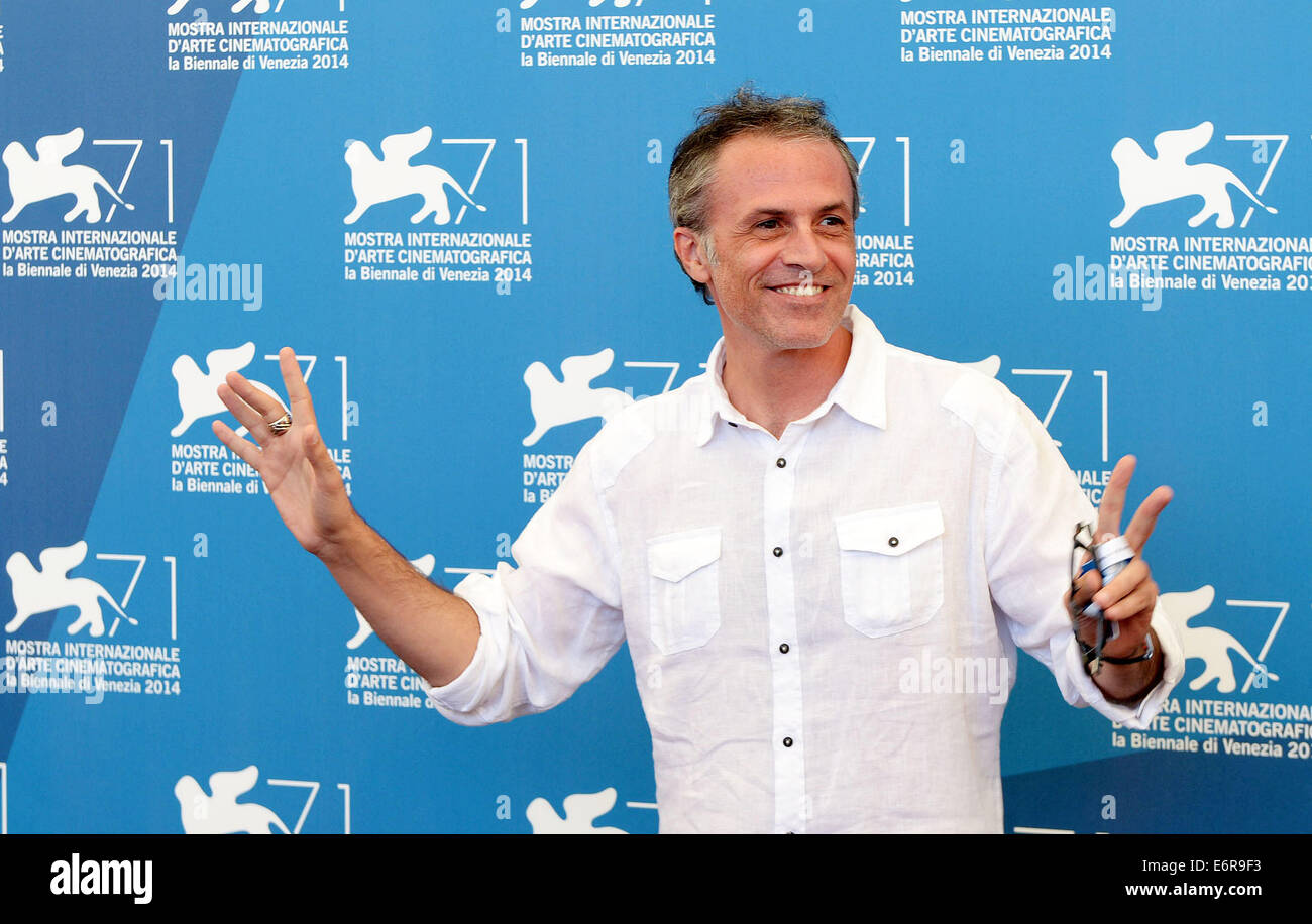 Venise. 29 août, 2014. L'acteur Fabrizio Ferracane pose au cours de l'appel à photo le film sélectionné pour la compétition principale au cours de la Pdrm Anime 71th Venice Film Festival, à Lido de Venise, l'Italie le 29 août. 2014. Credit : Liu Lihang/Xinhua/Alamy Live News Banque D'Images