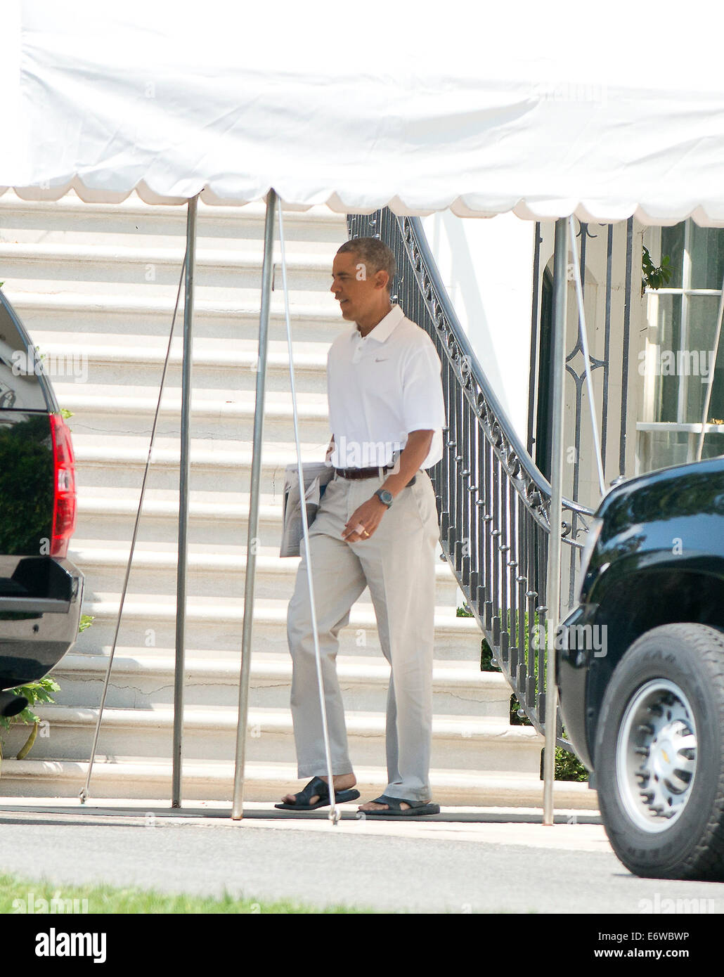 Washington DC, USA. 31 août, 2014. Le président des États-Unis Barack Obama quitte le portique sud de la Maison Blanche à Washington, DC Le dimanche, 31 août, 2014. Credit : Ron Sachs/Piscine via CNP Crédit : afp photo alliance/Alamy Live News Banque D'Images