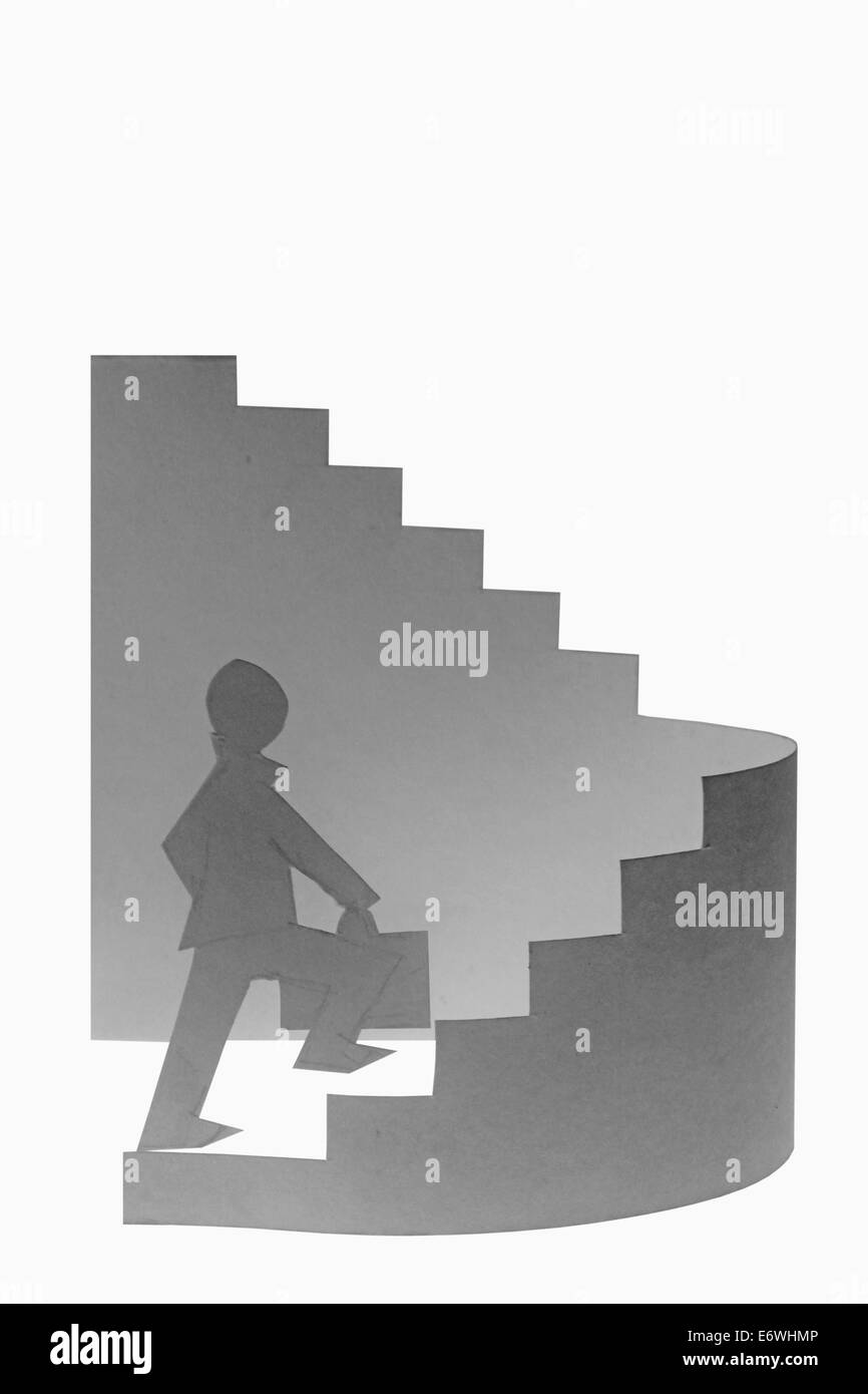 Businessman stepping up un escalier Banque D'Images