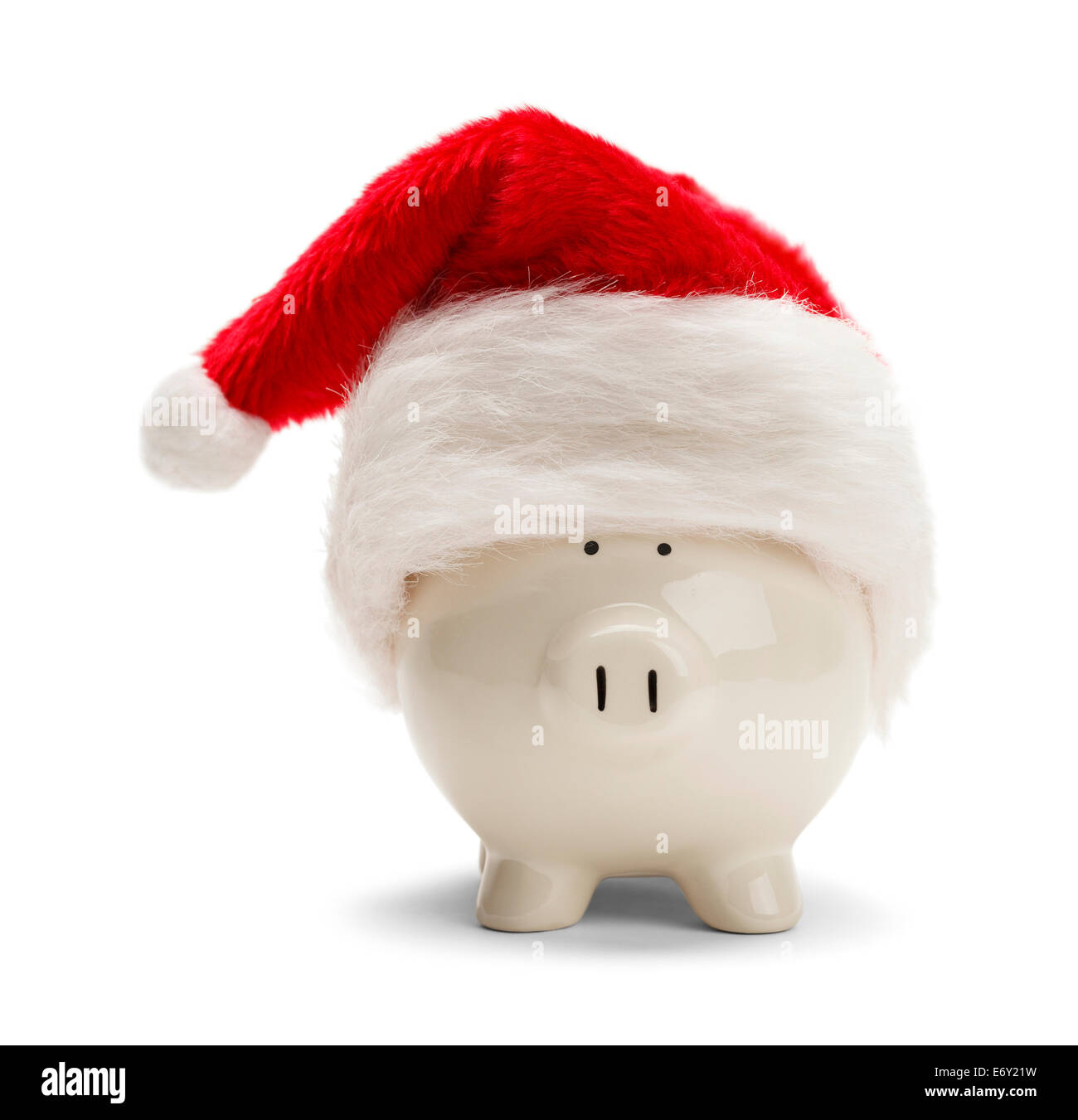 Piggy Bank With Santa Hat rouge isolé sur fond blanc. Banque D'Images