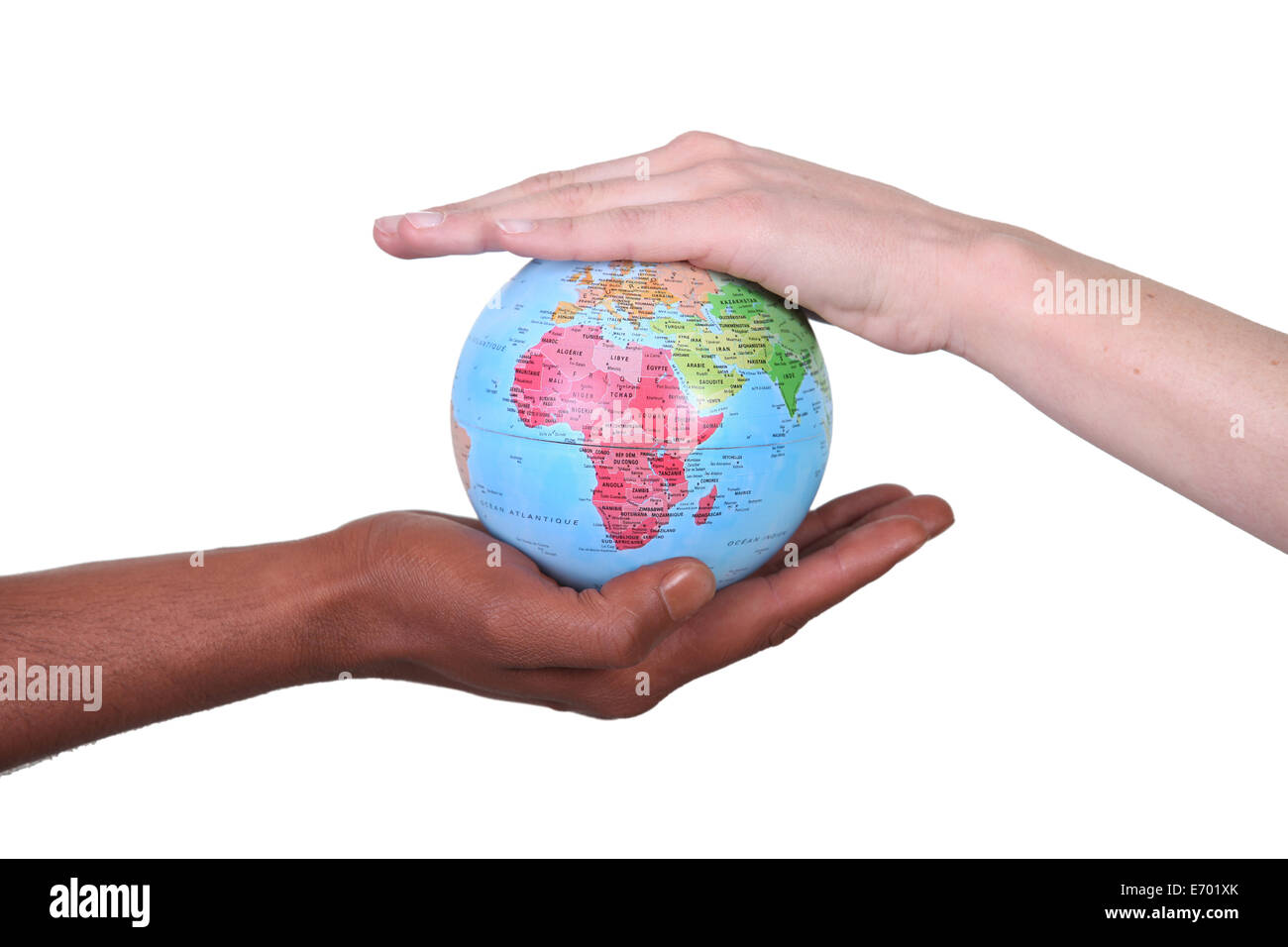 Deux mains toucher globe miniature Banque D'Images