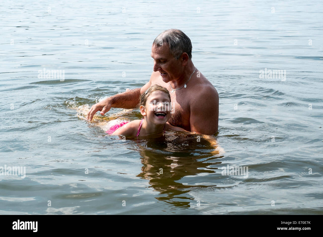 Des vacances en famille par Gieret Giby, Lac, Pologne Banque D'Images