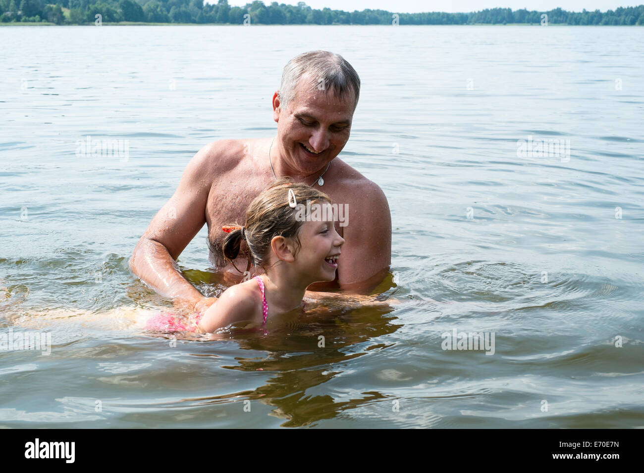 Des vacances en famille par Gieret Giby, Lac, Pologne Banque D'Images