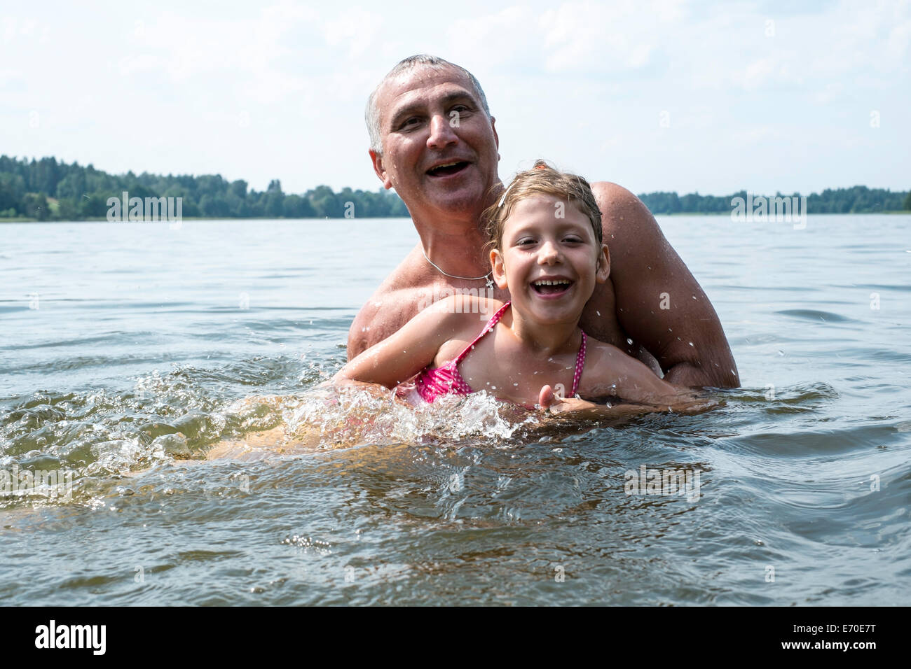 Des vacances en famille par Gieret Giby, Lac, Pologne Banque D'Images