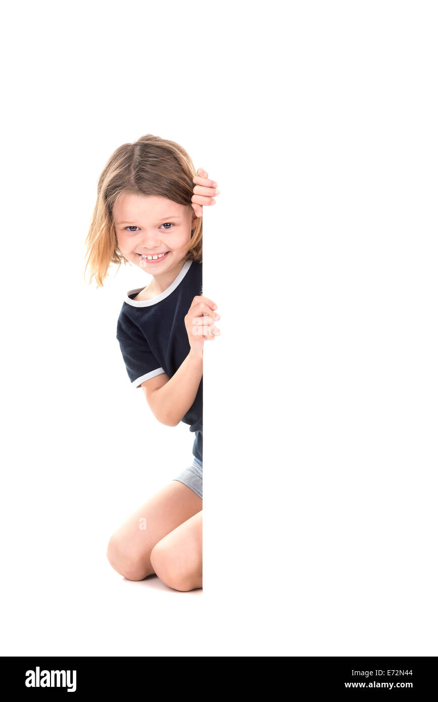 Jeune fille posant avec un tableau blanc Banque D'Images