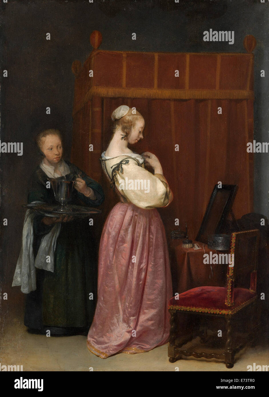 Une jeune femme à sa toilette avec une femme de ménage - par Gerard Ter Borch le Jeune, 1651 - éditorial uniquement. Banque D'Images
