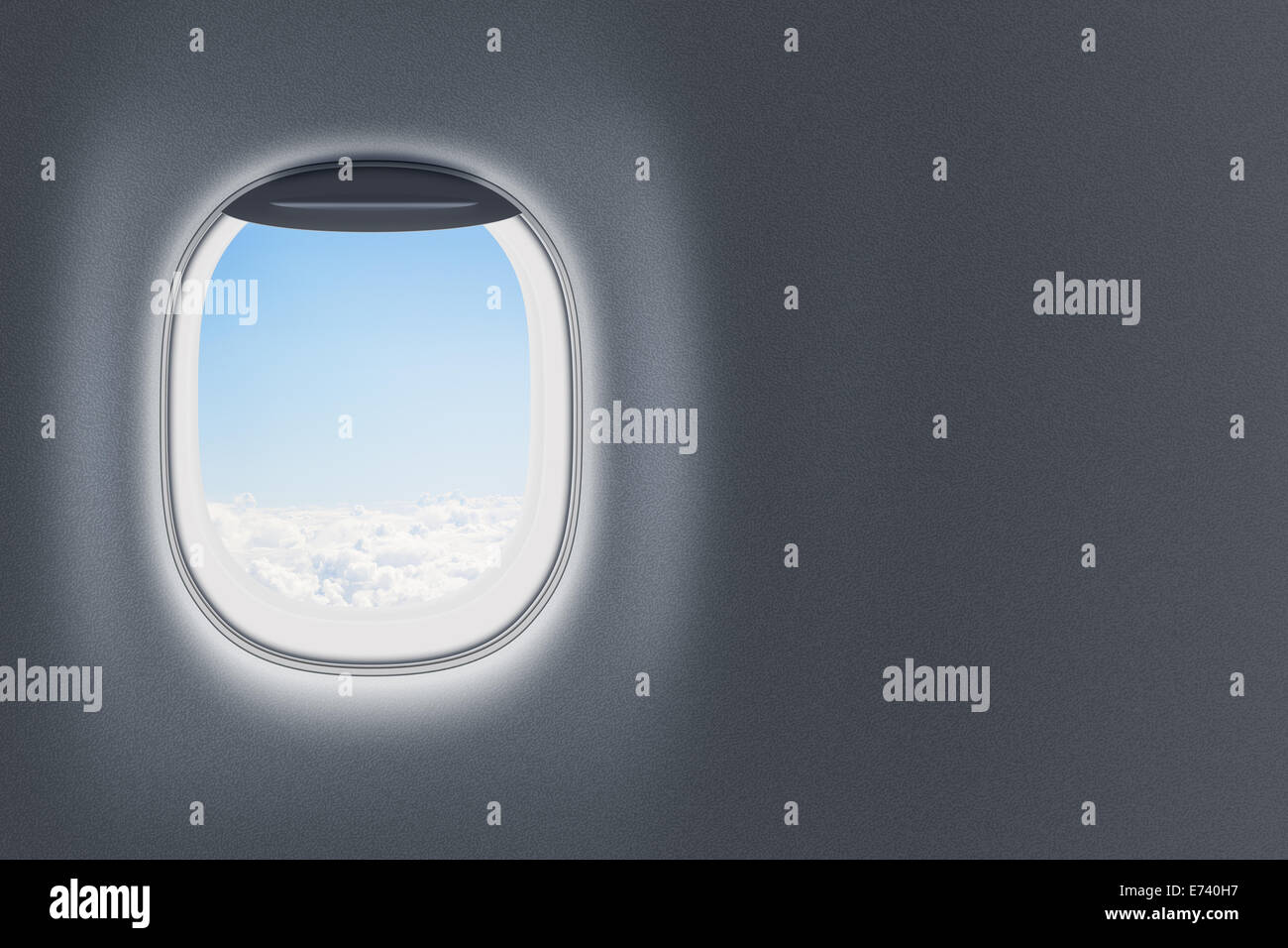 Jet d'un avion ou d'une fenêtre sur mur à l'espace blanc Banque D'Images
