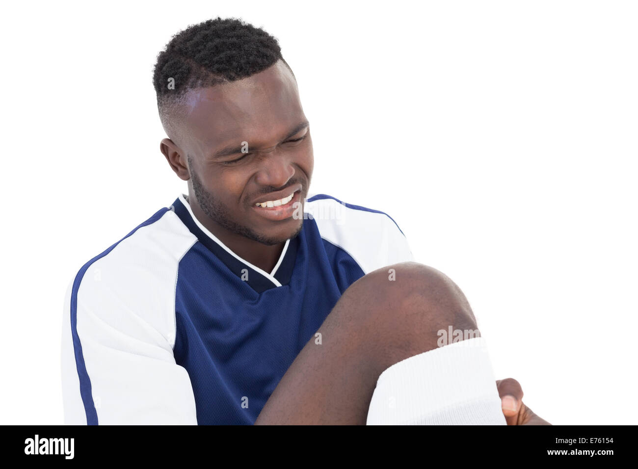 Joueur de football dans la douleur Banque D'Images